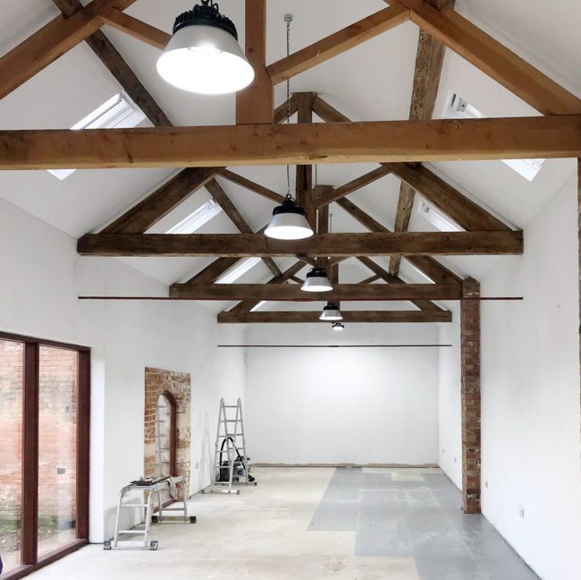 Barn conversion in Retford Nottinghamshire - freshly plastered and painted. Pitched ceiling and wooden beams