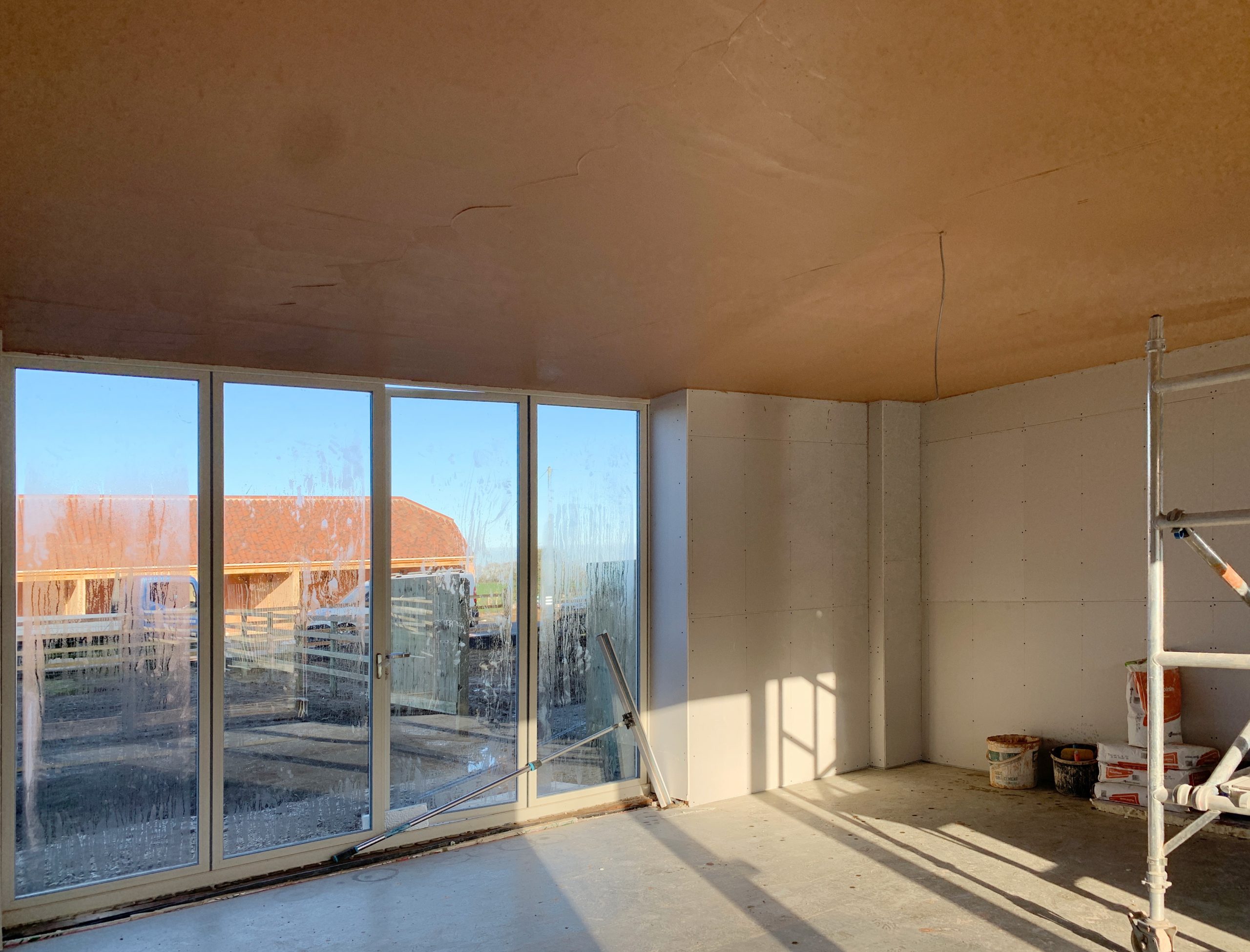 Barn conversion living room plaster boarded ready for plastering