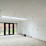 Large kitchen renovation newly plastered and painted white