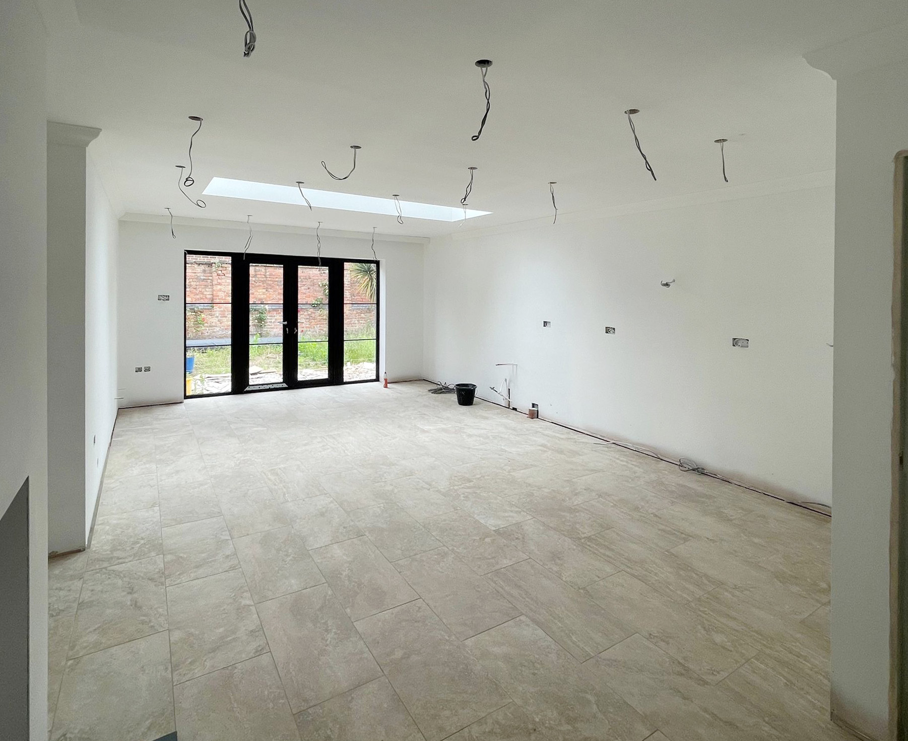 Large kitchen renovation newly plastered and painted white