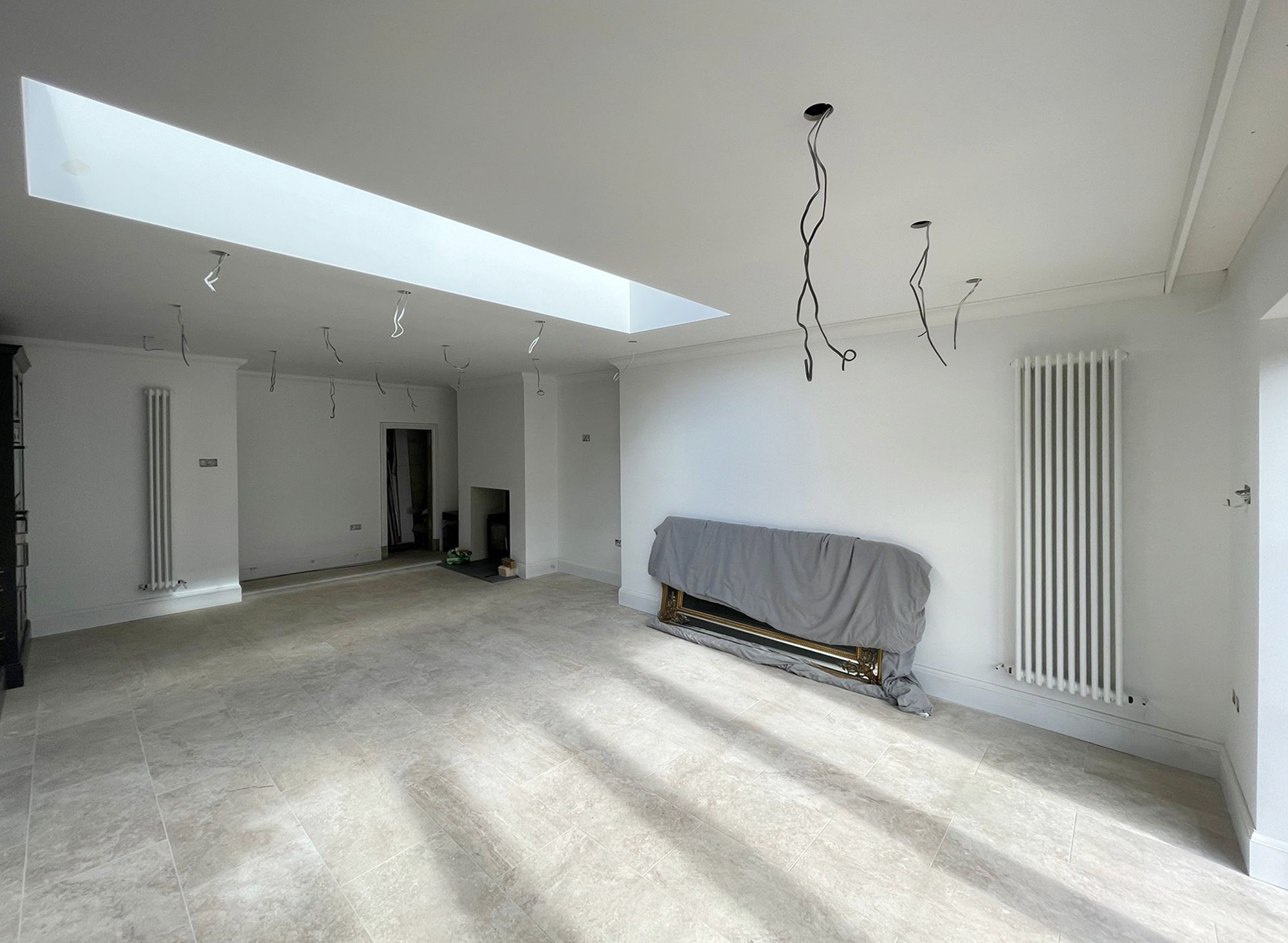 Large kitchen renovation newly plastered and painted white