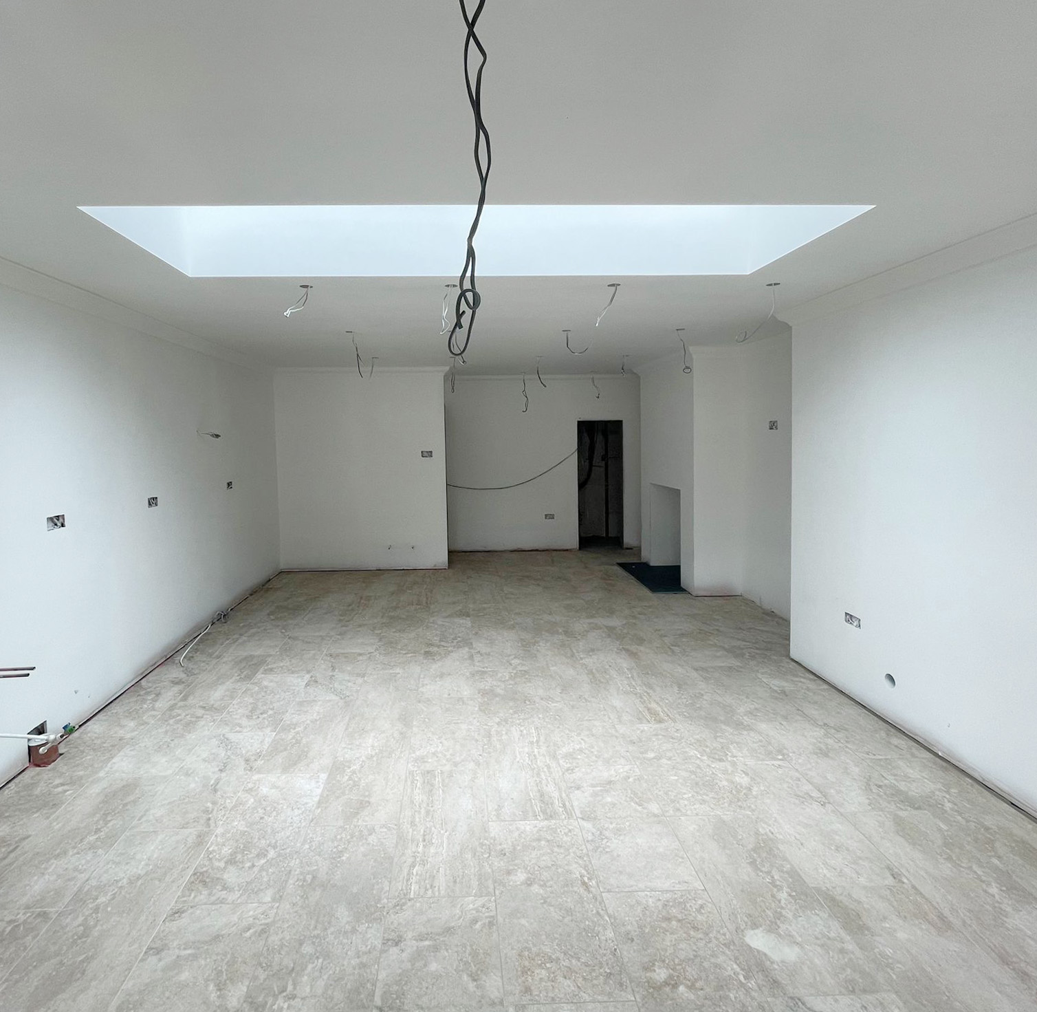 Large kitchen renovation newly plastered and painted white